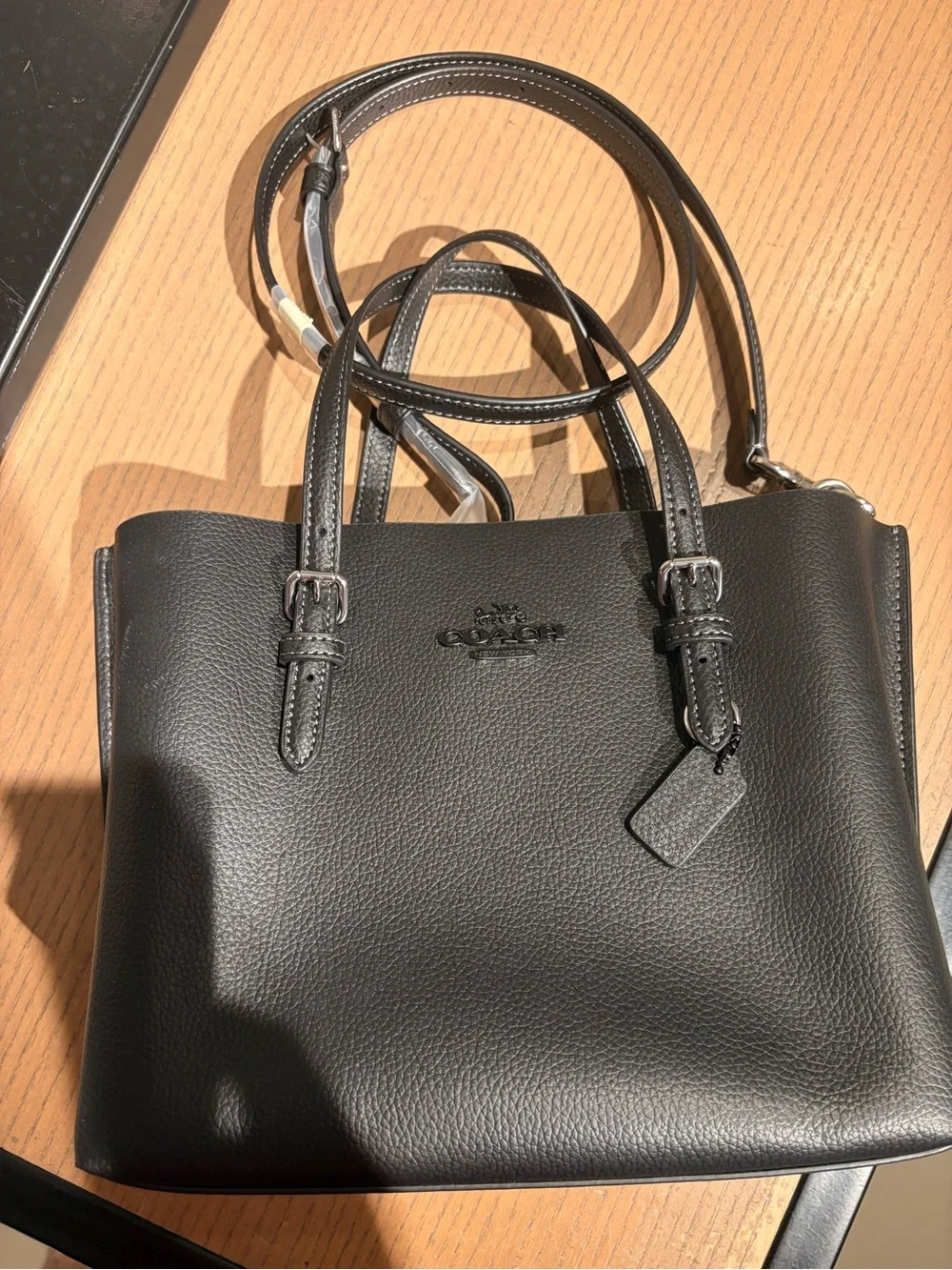 Coach sleek pebbled